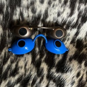 Tanning protective eyewear